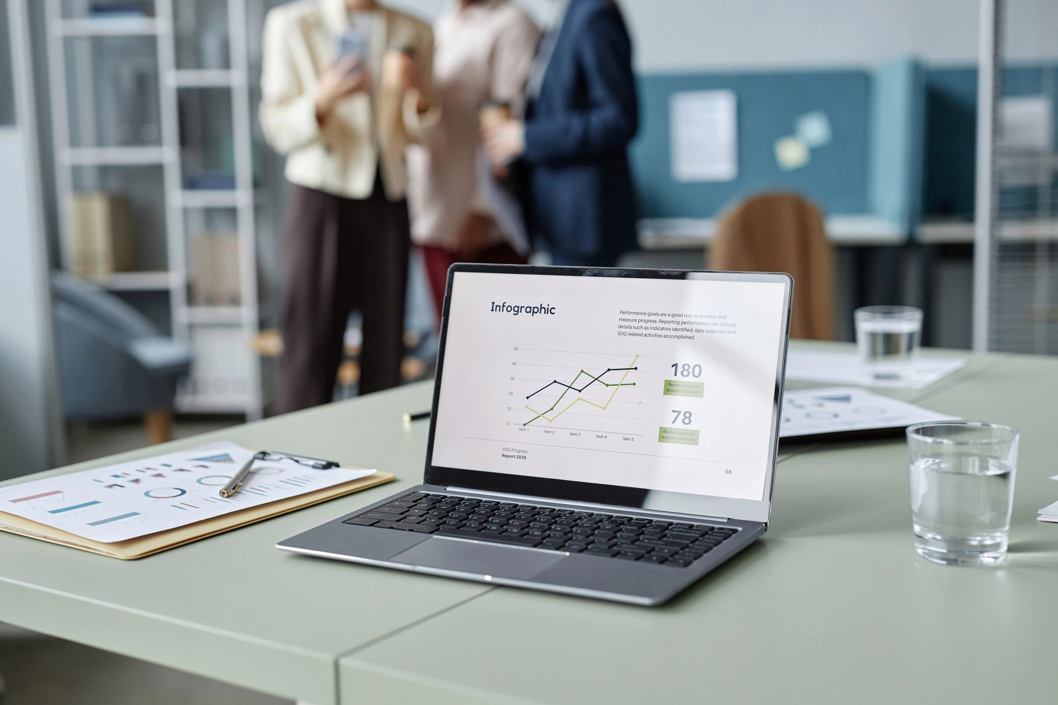 Laptop on a desk displaying a business report
